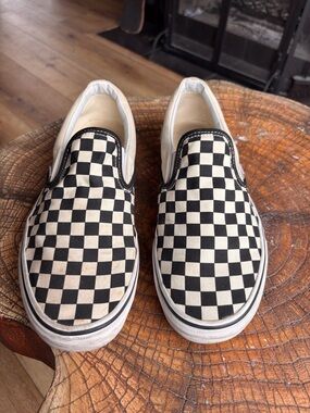 Vans Black and White Checkerboard Slip-On Sneakers